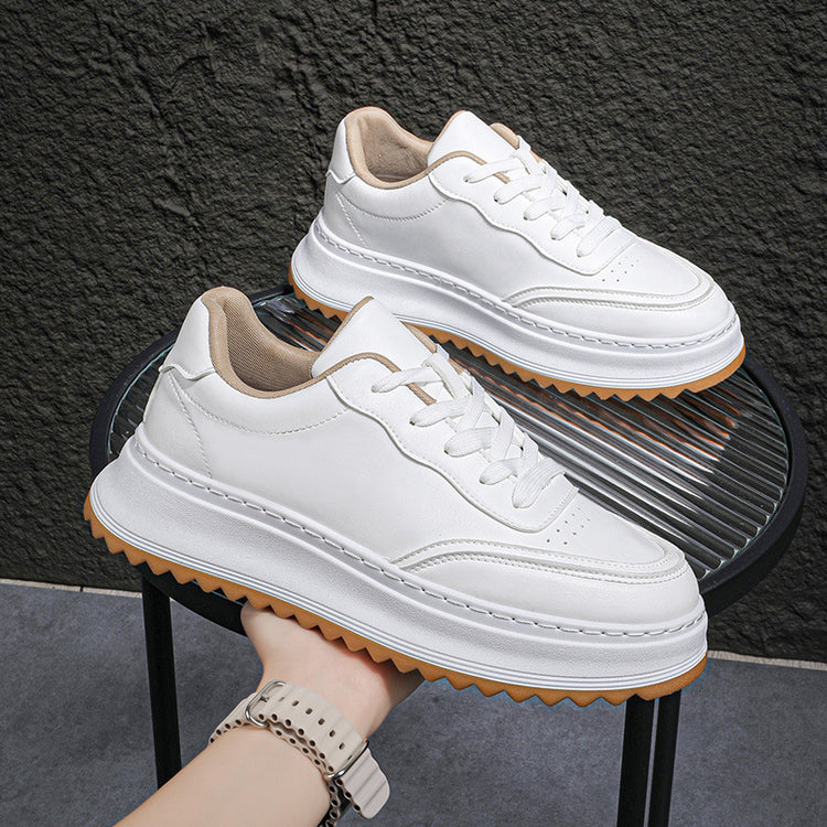 White lace-up sporty casual shoes with thick sole and tan interior lining
