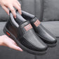 Fleece-lined waterproof slip-on shoes, black leather upper with elastic gores and padded lining