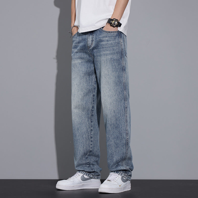 Light blue straight jeans with worn texture and straight leg from waist to cuff