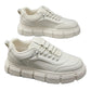Off-white lace-up chunky-sole sneakers, side profile view, padded collar and perforated toe