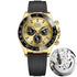 Gold-tone mechanical-style men’s watch with champagne dial and black silicone strap