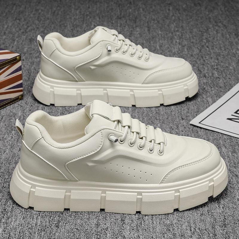 Off-white lace-up chunky-sole sneakers, front view, stitched side panels and perforations