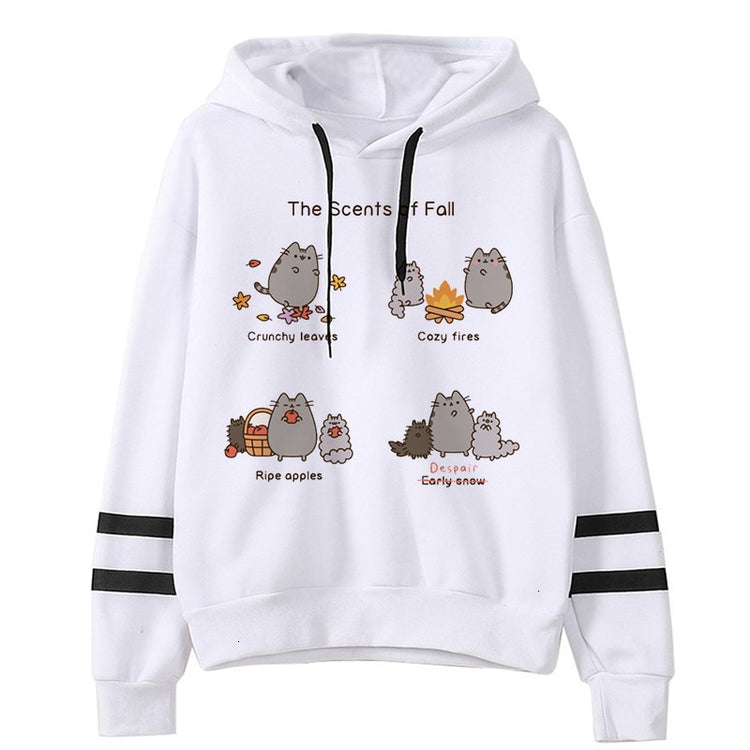 White fleece hoodie with seasonal cat prints, black drawstrings, and striped sleeve cuffs