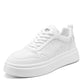 White height-increasing sneakers with lace-up front, textured upper, and thick platform sole