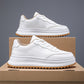 White lace-up sporty casual shoes with chunky sole and contrast stitching