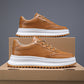 Brown lace-up sporty casual shoes with chunky sole and contrast stitching
