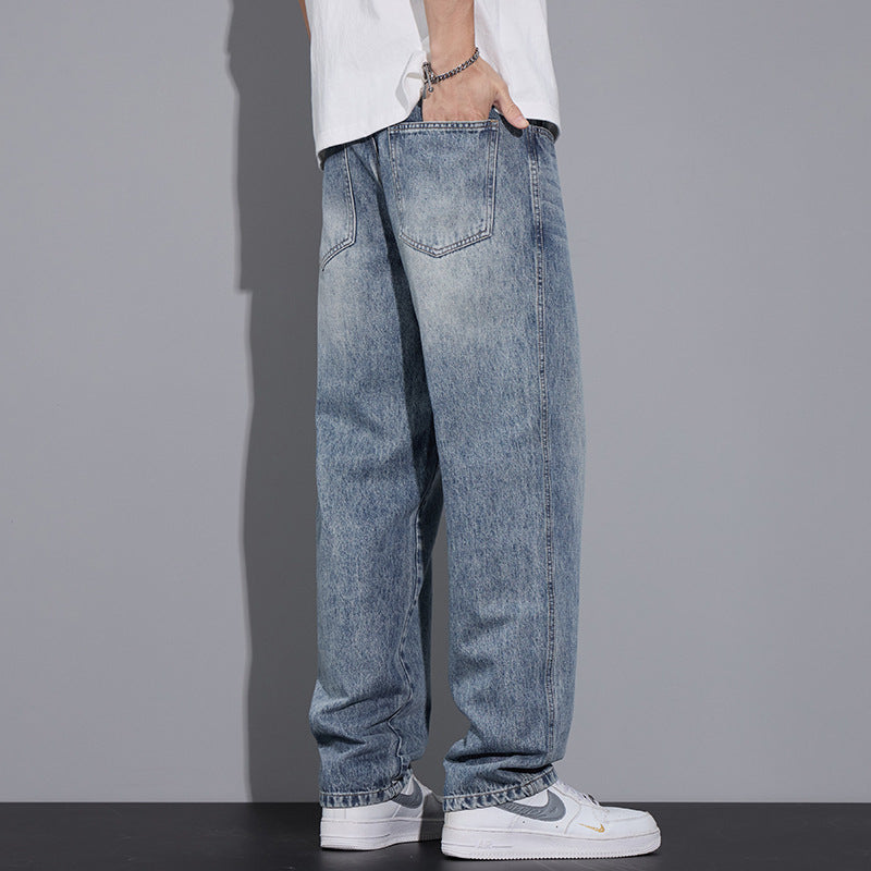 Light blue straight jeans, back view with two patch pockets and straight leg