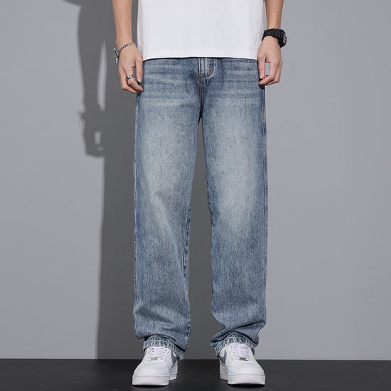 Light blue straight jeans with loose fit, front seam and belt loops