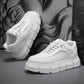 Off-white lace-up chunky-sole sneakers, front and side angles, thick tread rubber sole