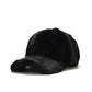 Plush fleece baseball cap with rabbit-fur look, black, curved brim in side profile